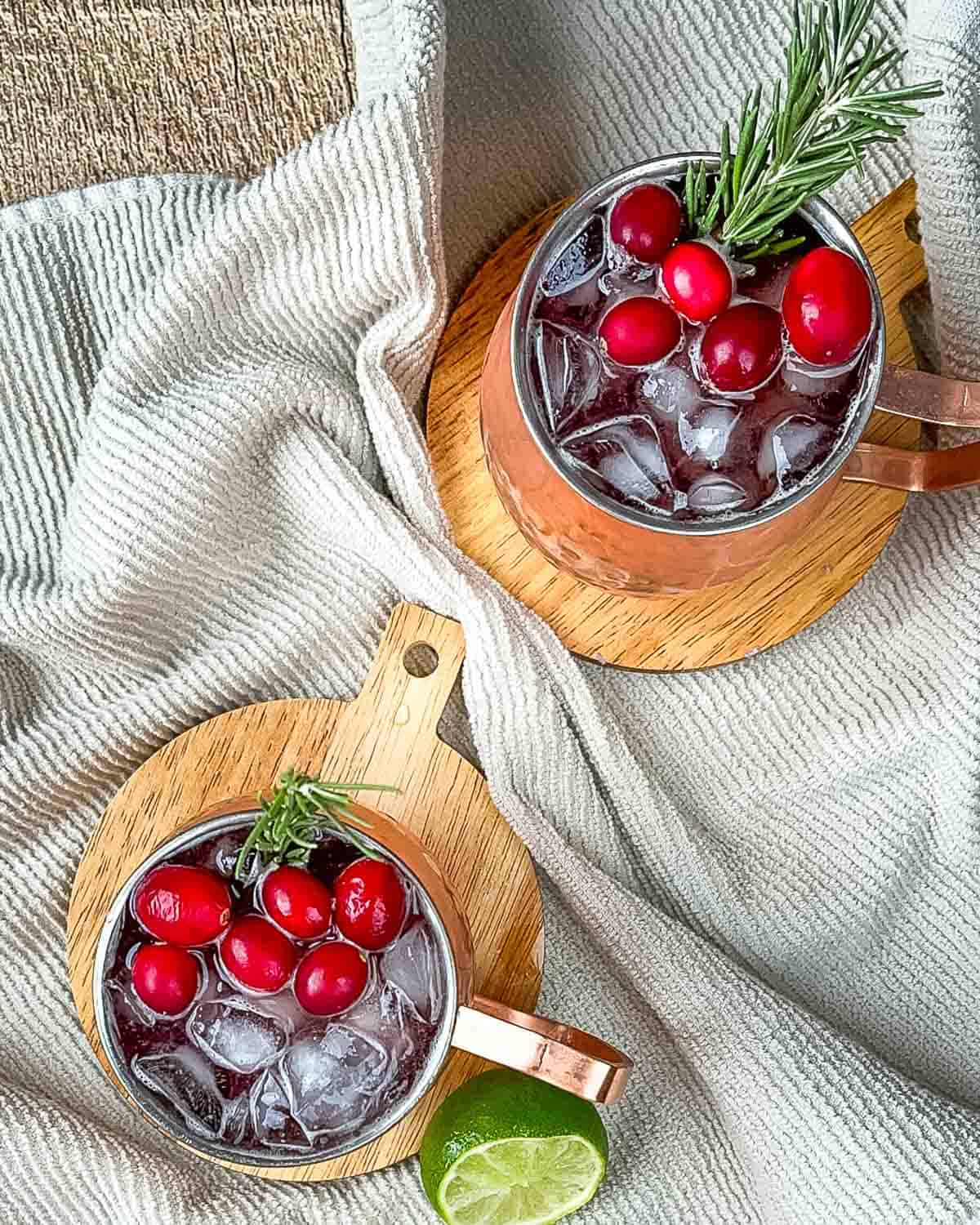 Cranberry Moscow Mule With Fresh Rosemary - SIp and Feast